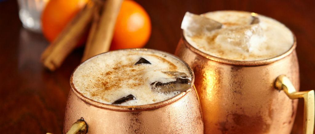 Gin cocktail in copper mugs