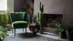 the compact vesper green velvet cocktail chair is a perfect small space solution